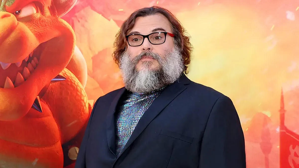 Jack Black poses on the red carpet for The Super Mario Bros. Movie.
