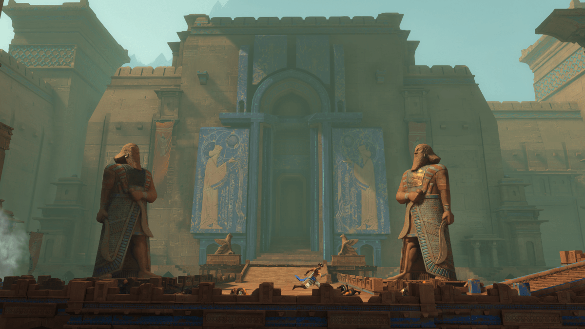 Sargon runs in front of two statues and a temple in Prince of Persia: Lost Crown