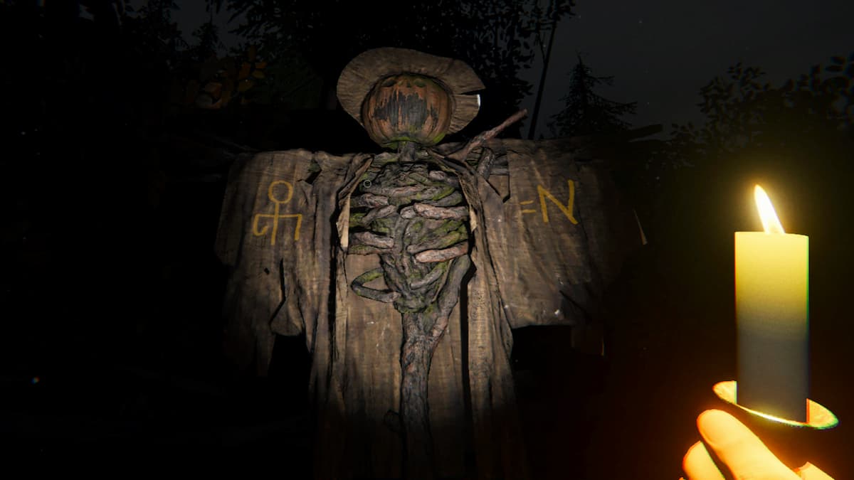 The player lighting a hidden message on a scarecrow in Phasmophobia.