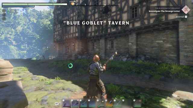 Enshrouded Player standing in front of the Blue Goblet Tavern