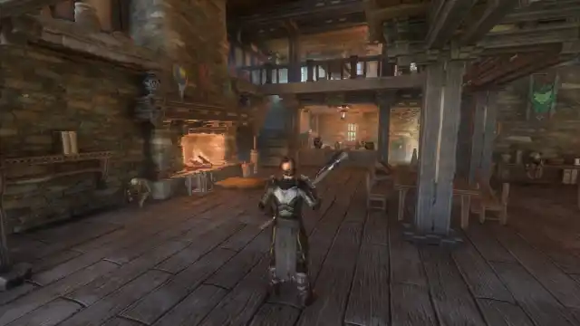 Enshrouded player standing inside the Blue Goblet Tavern