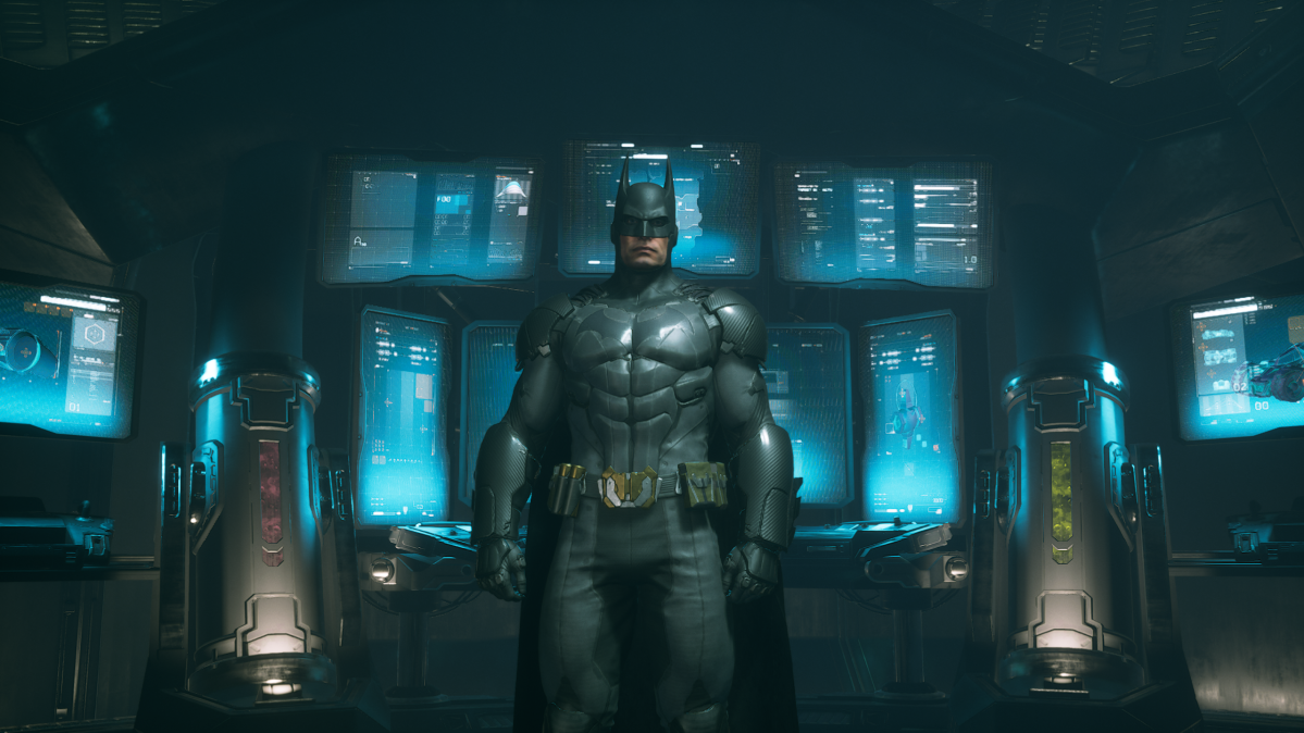 Batman's hologram standing in his batcave.