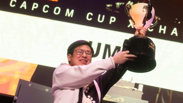UMA holding a trophy at Capom Cup X.