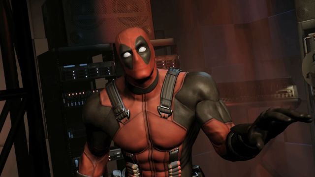 Image of Deadpool facing the camera expressively emoting with his arms in the Deadpool game.