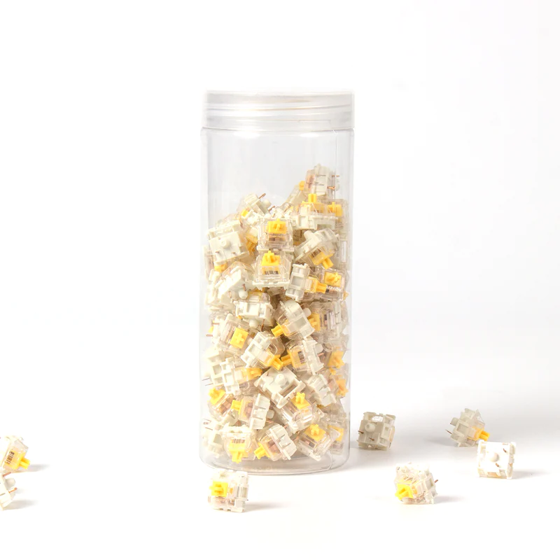 A jar full of Gateron G Pro Yellow linear switches