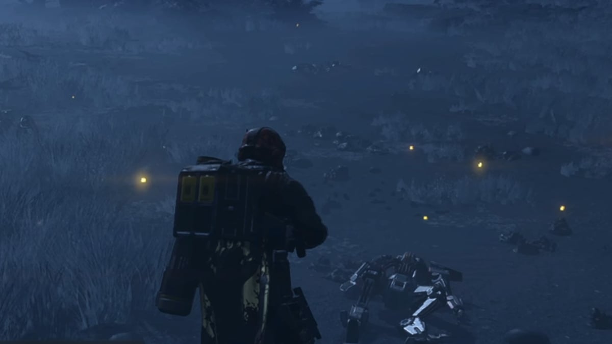 Helldiver carry supply pack on their back while looking at a Automaton corpse in front of them in Helldivers 2