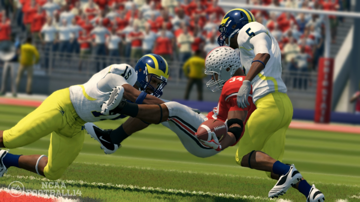 College football players making a tackle in NCAA 14.