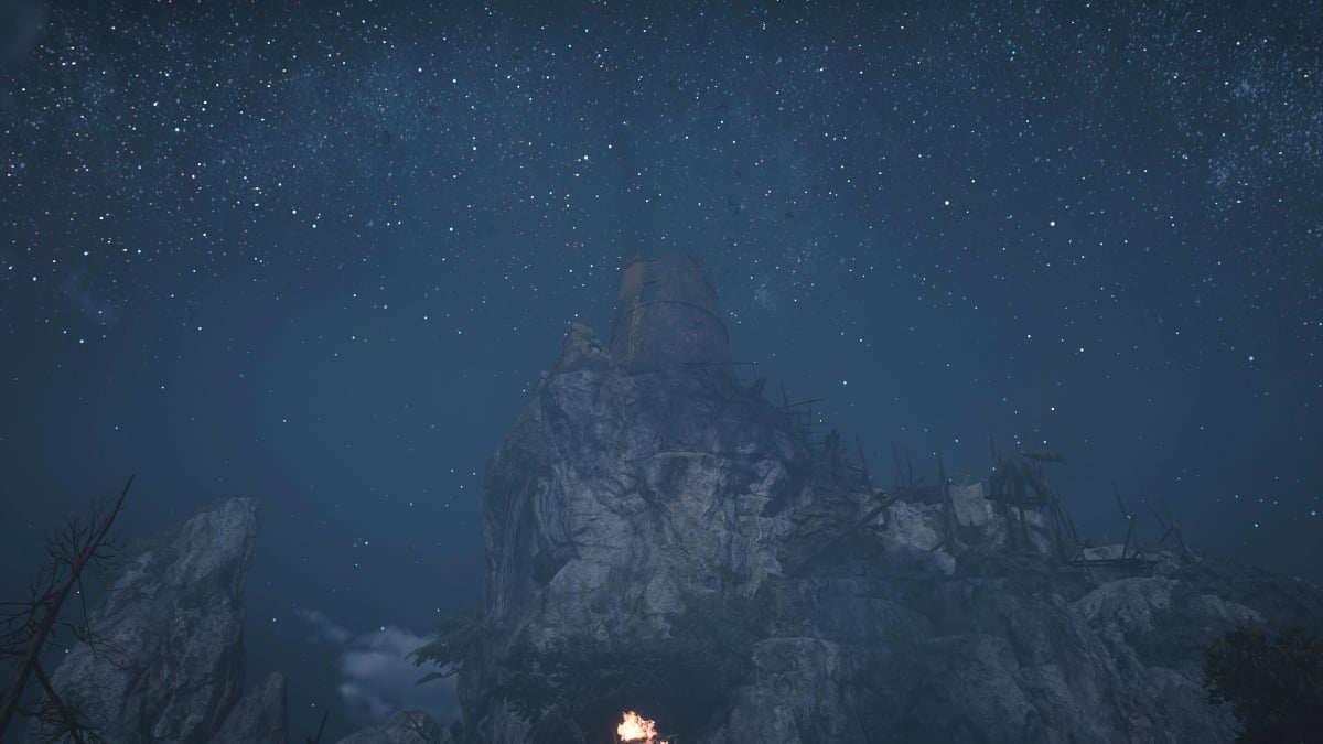 The Ruined Lighthouse in Skull and Bones beneath a sky full of stars.