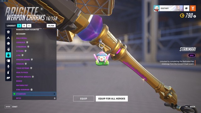 Brigitte's golden melee weapon in Overwatch 2, accessorized with a LE SSERAFIM charm.