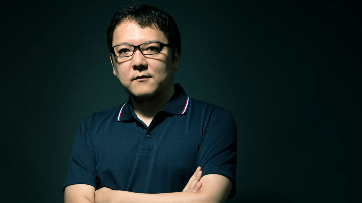 Hidetaka Miyazaki posing for a picture.