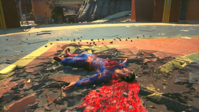 Dead Superman lying on the ground in Suicide Squad: Kill the Justice League.