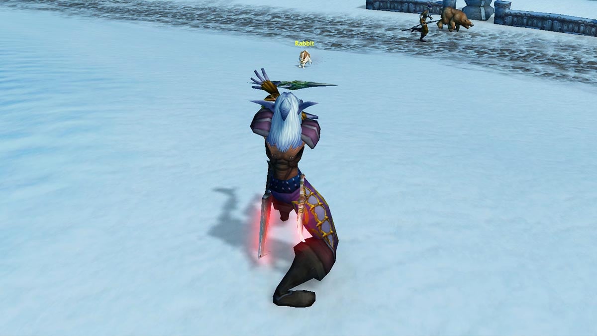 Night Elf Rogue using Shuriken Toss on a rabbit in Dun Morogh in WoW SoD