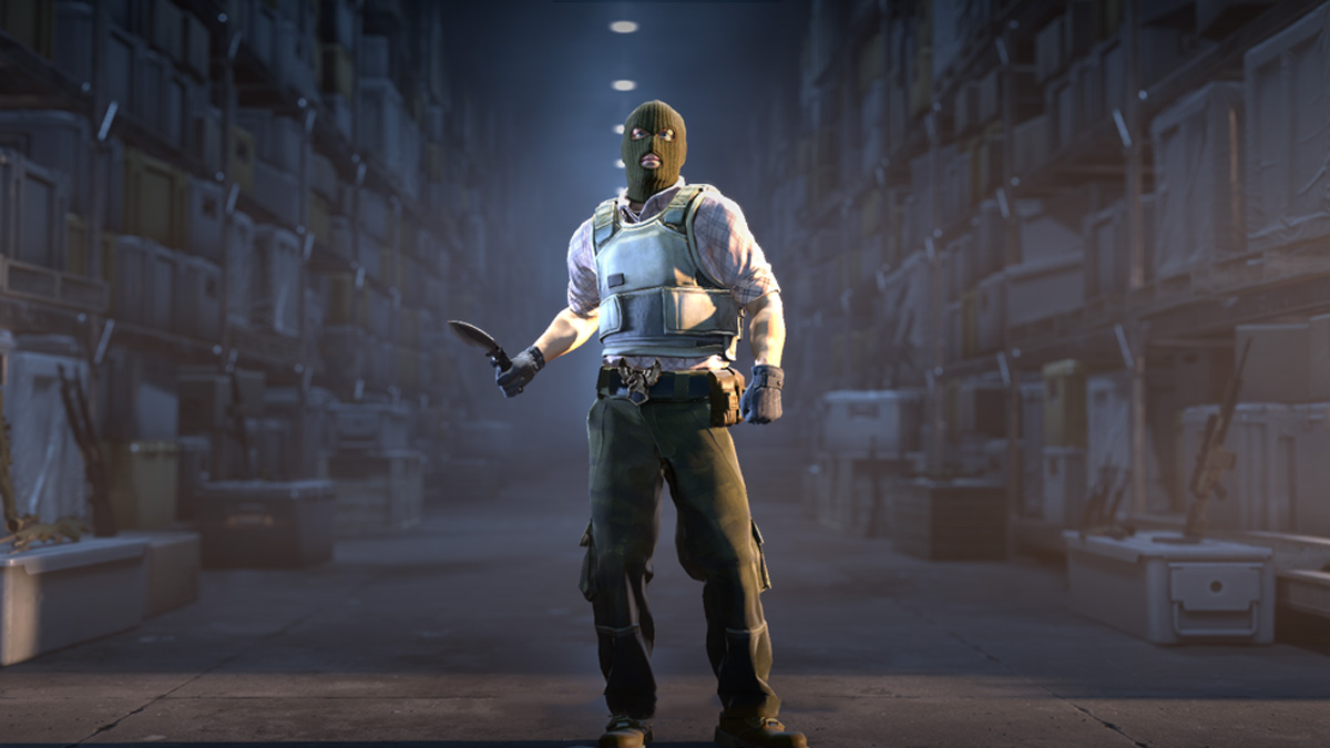 A player wields a Kukri Knife in CS2's warehouse.