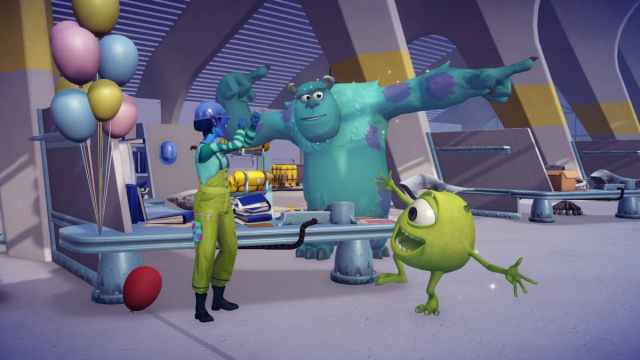 The player celebrating and dancing with Mike and Sulley.