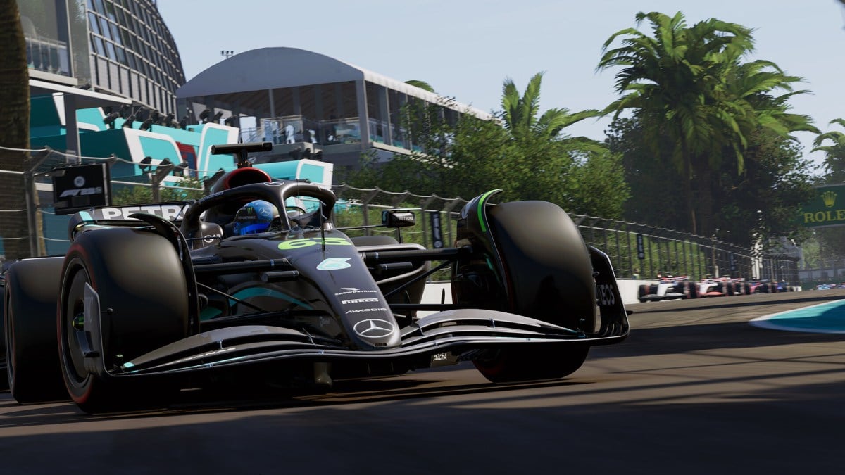 George Russell, wearing a blue helmet, driving a black Mercedes AMG Petronas car with 63 on the nose.