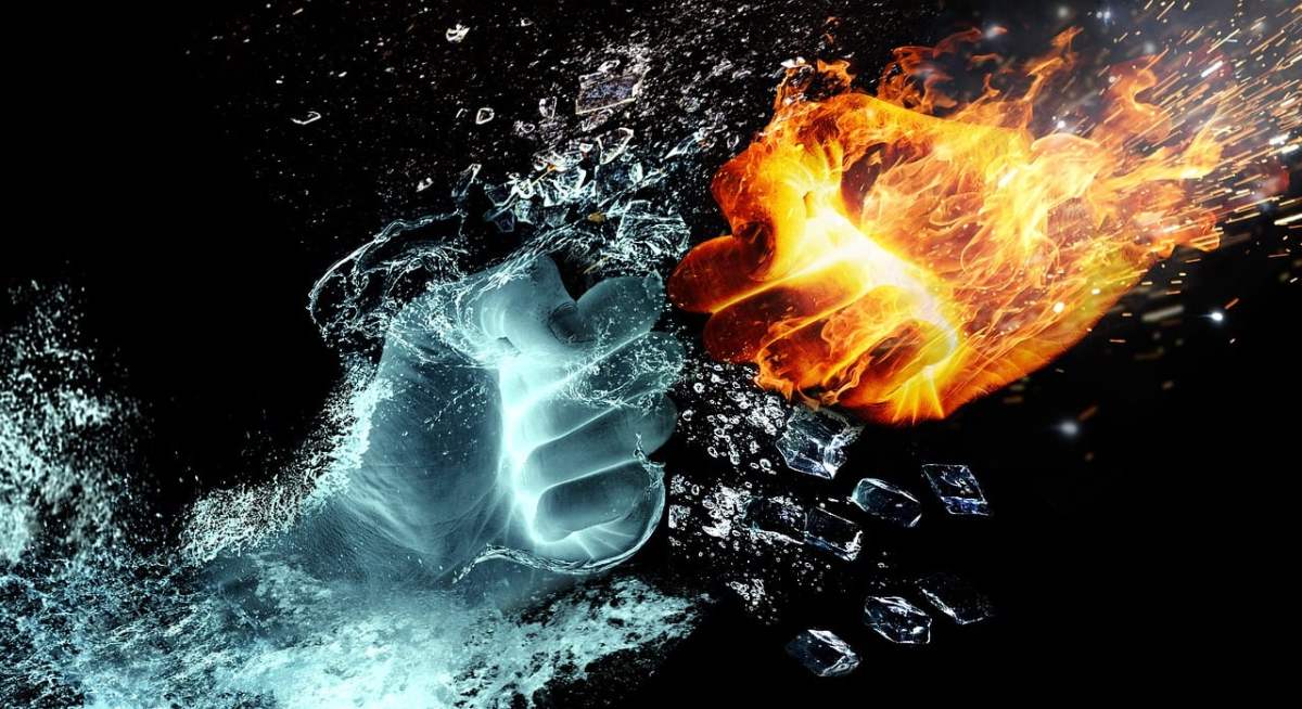 A fire fist and a water fist and clashing