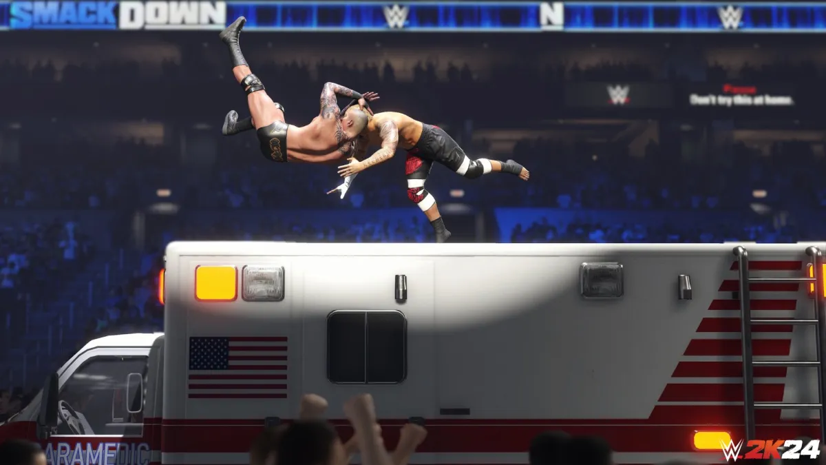 Randy Orton RKOing Solo Sikoa on top of an ambulance.