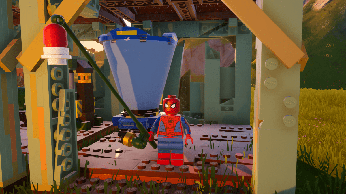 Spider-Man standing next to a food processor in LEGO Fortnite.
