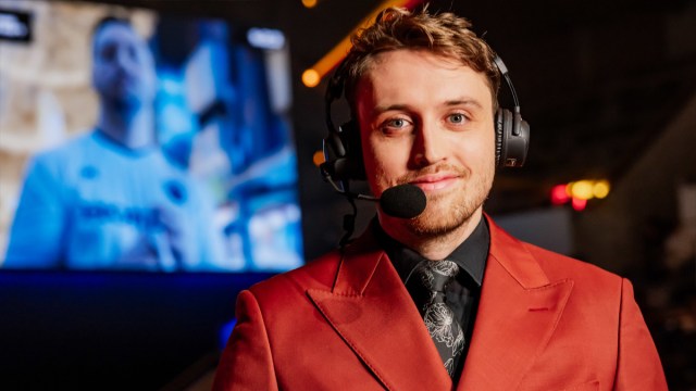 Hysterics, a League of Legends caster, commentates at Worlds 2023.