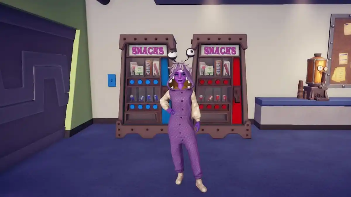 The player posing by some of the vending machines containing soda.