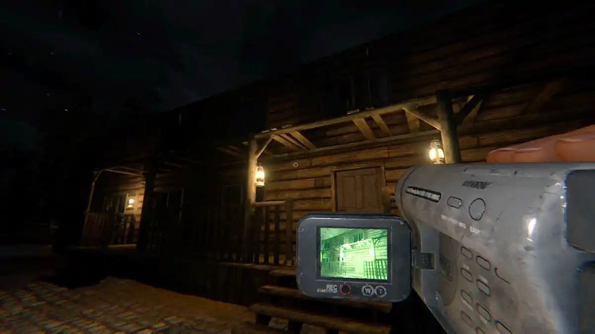 The player recording the outside of Bleasdale Farmhouse using a Video Camera.