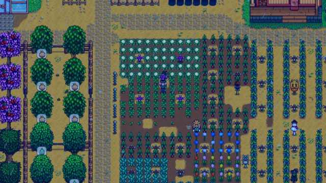 Stardew Valley character is holding a Sprinkler