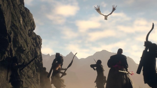 A couple of archers and a mage are looking at a giant bird in the sky in Dragon's Dogma 2