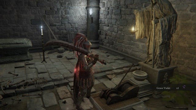 A knight stands in front of a statue with a lever already pulled to open a door elsewhere in the dungeon in Elden Ring.