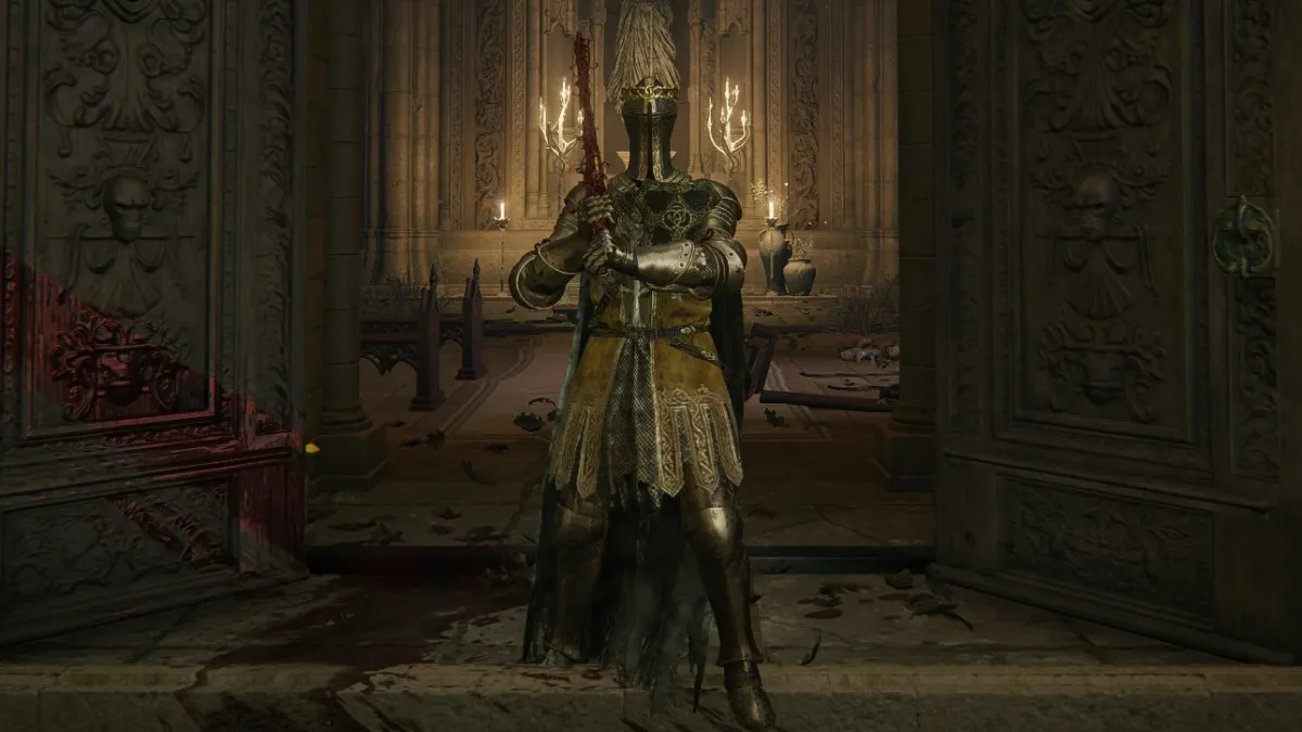 A Knight holds a barbed sword after killing somebody in Elden Ring.