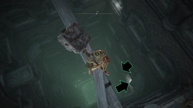 A man stands on a wooden post above a pit in Elden Ring. A series of arrows show how to drop down to get to the Inescapable Frenzy Incantation.