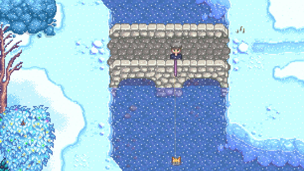 Character fishing over a bridge in Winter in Stardew Valley