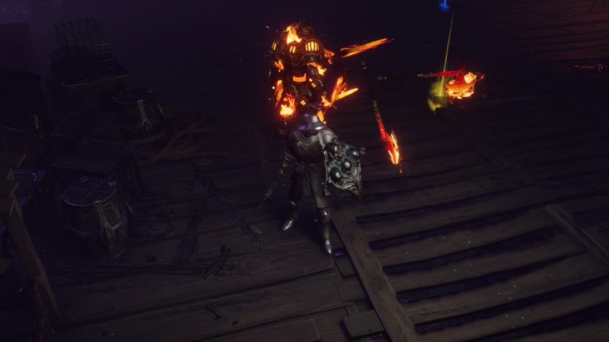 A man in heavy steel armor and a shield stands in front of a fiery suit of armor and flaming weapons in Last Epoch.