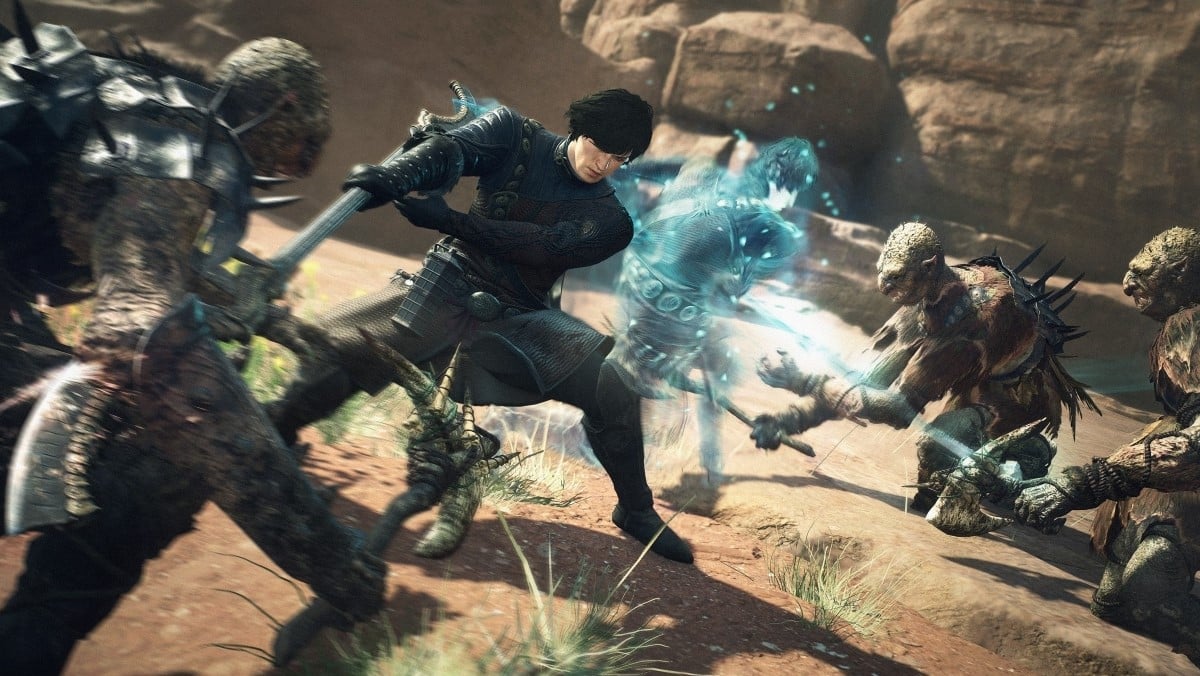 A man holding a spear and a clone of him strike monsters in Dragon's Dogma 2.