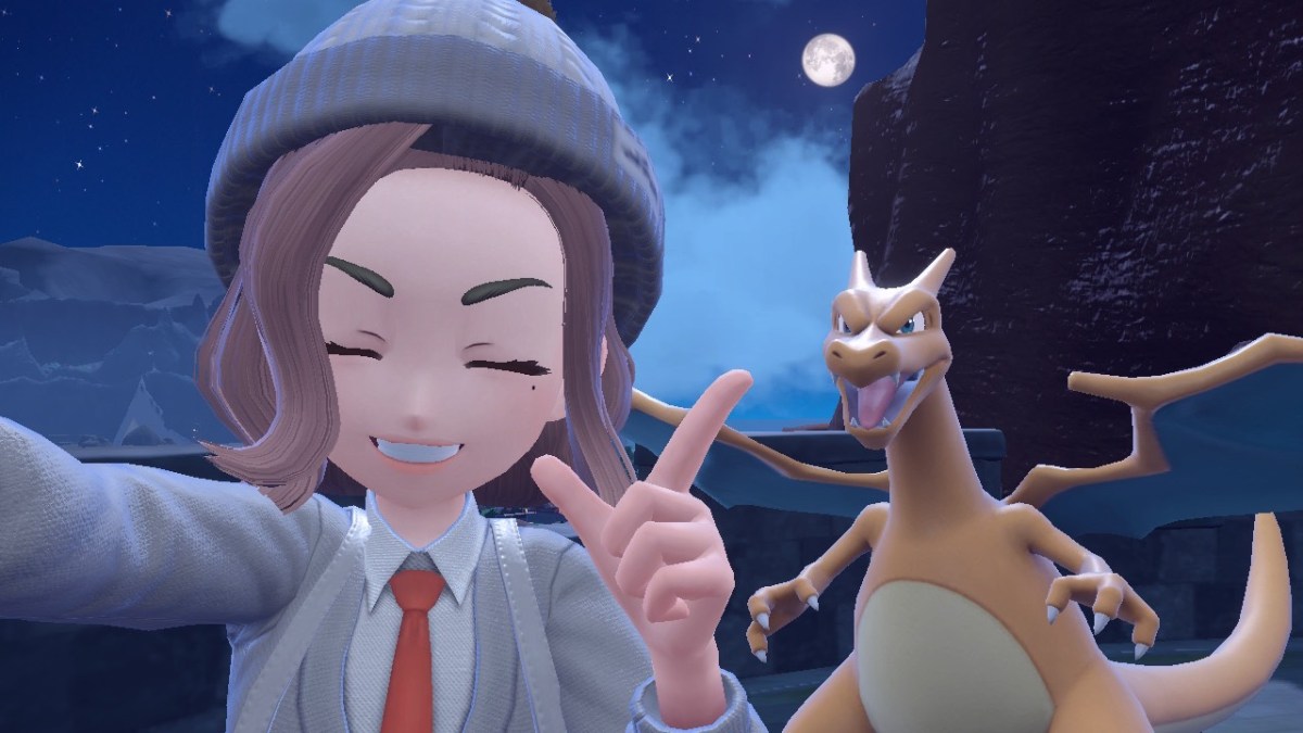 Trainer posing for a selfie with Charizard in Pokémon Scarlet and Violet.