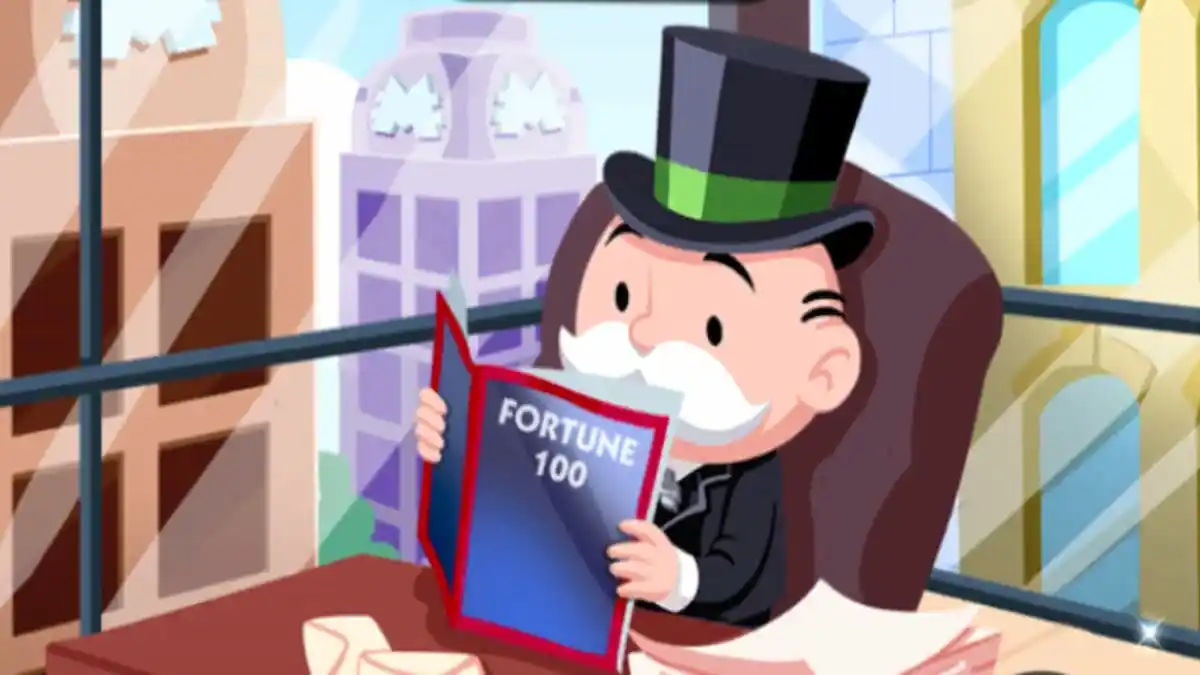 Mr. Monopoly reading at his office desk