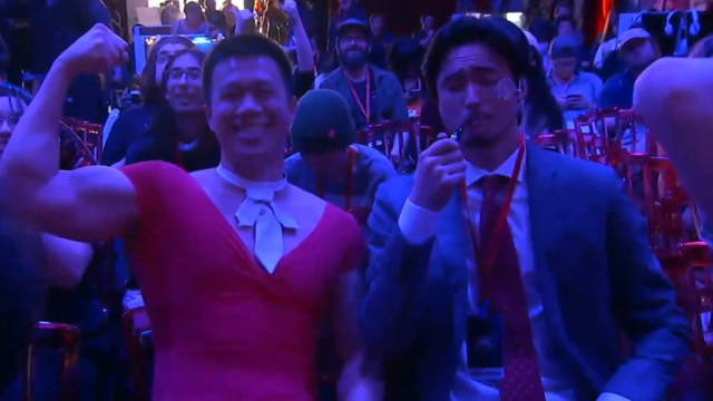 Two cosplayers dressed as Slayer and his wife Sharon at the Arc World Tour Finals.