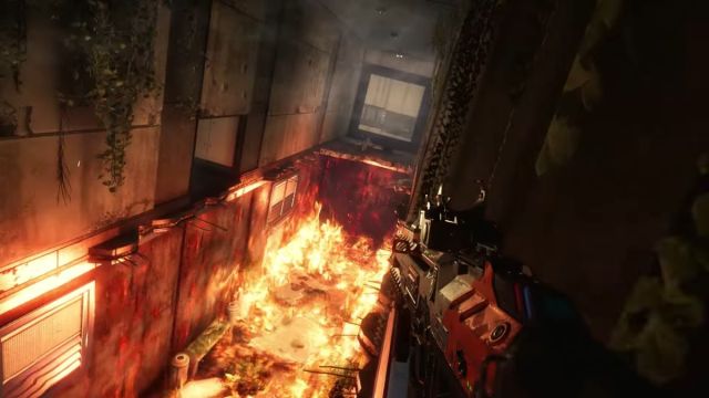 Image of a wallrunning pilot in Titanfall 2 in the mission Gauntlet. There is fire scattered across the hallway's caved in floor.