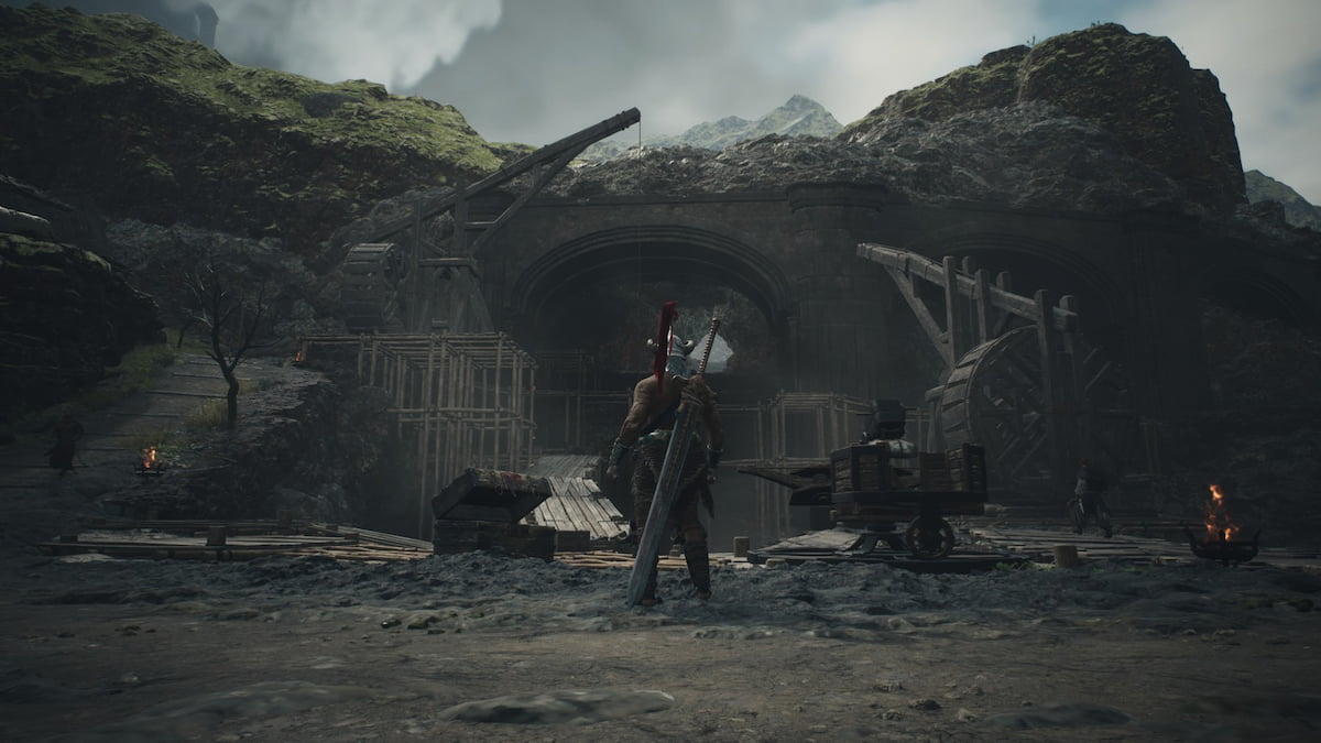 The player character standing in front of the Volcanic Island Camp.