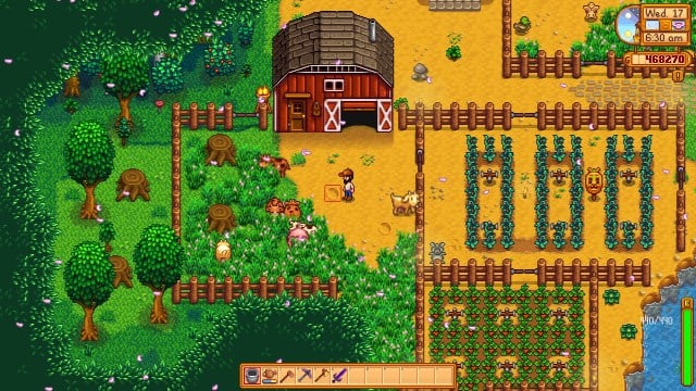 Crops and cows on a forest farm in Stardew Valley.
