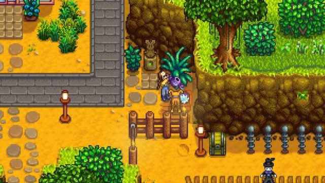 The player giving their pet some water in Stardew Valley.