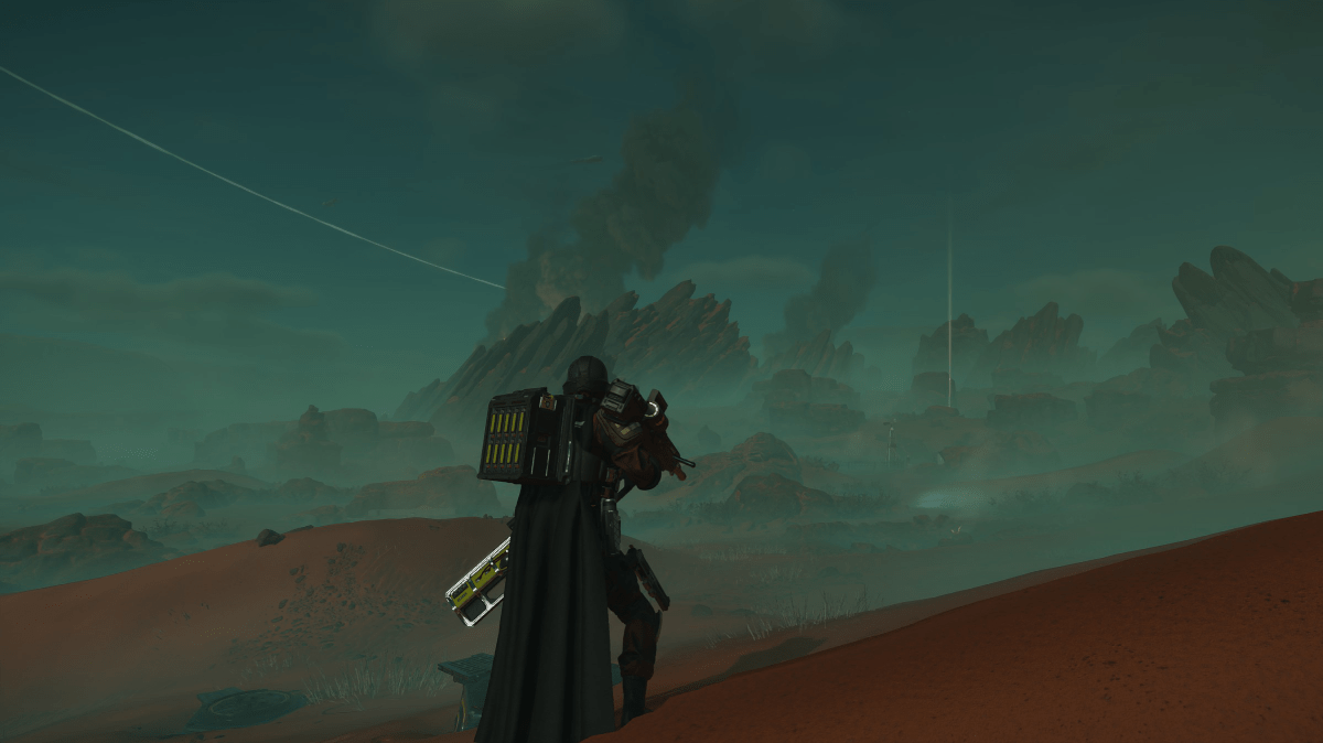 A Helldivers 2 player looking off into the distance with his Autocannon.