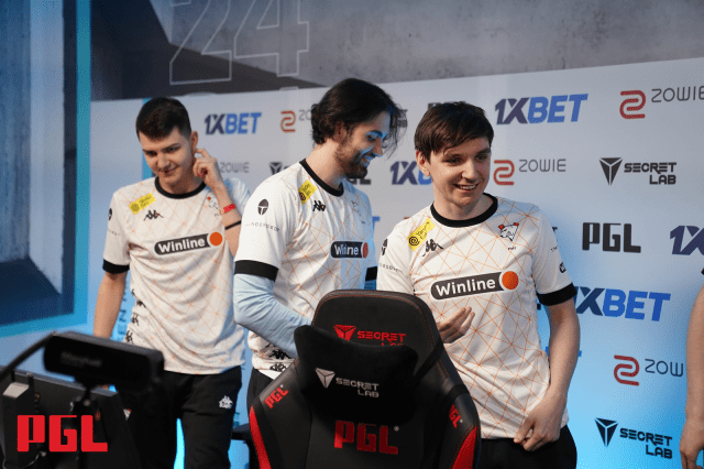 Virtus Pro players stand cheering after qualifying for the PGL Copenhagen Major.