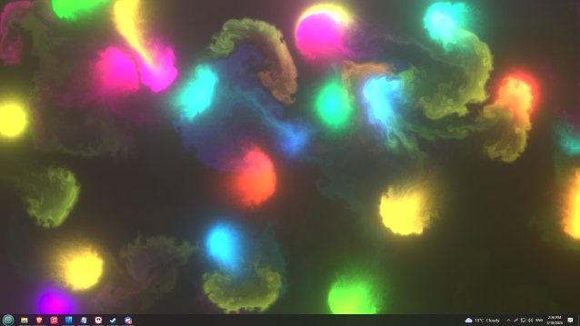 Colorful balls of smoke appearing on a desktop.
