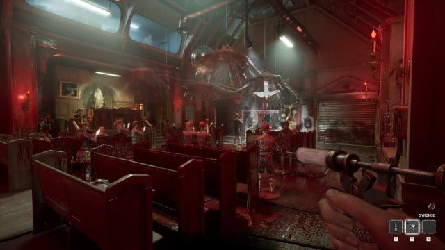 The player holding a Syringe in a bloody room in The Outlast Trials.