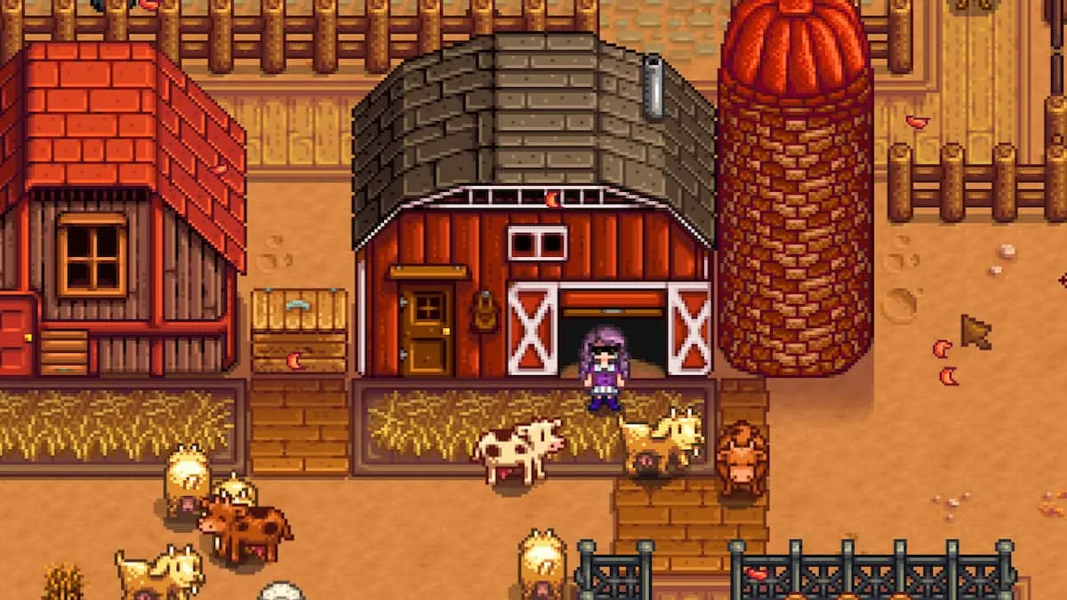 Player in front of the barn in Stardew Valley.