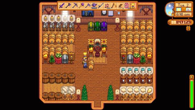 The player about to put Wheat into a Keg in Stardew Valley.