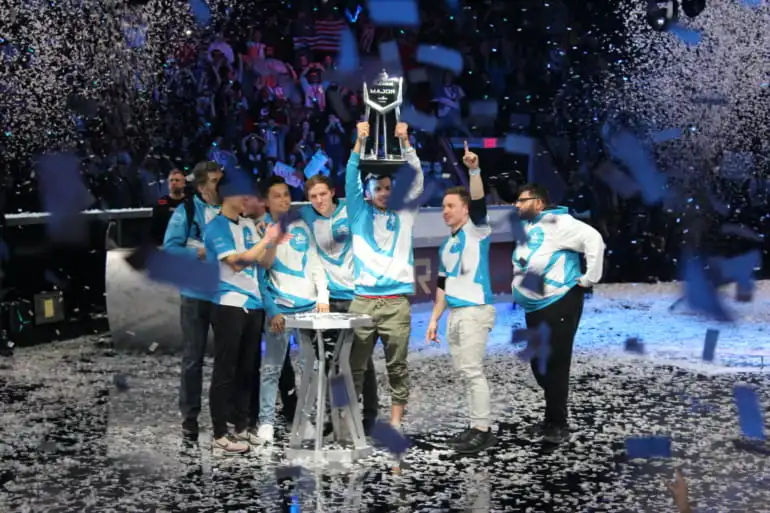 Cloud9 celebrate with the ELEAGUE Boston Major trophy.