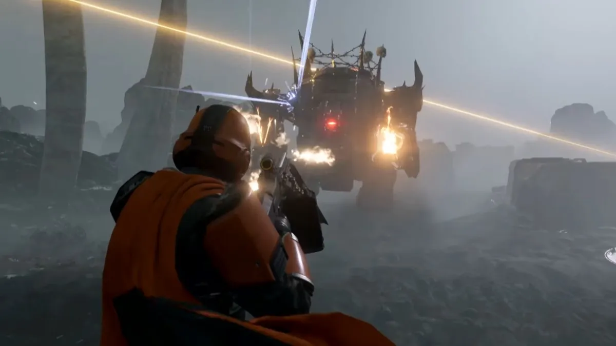 A Helldivers 2 soldier fires uselessly at a heavily armored robot in Helldivers 2.