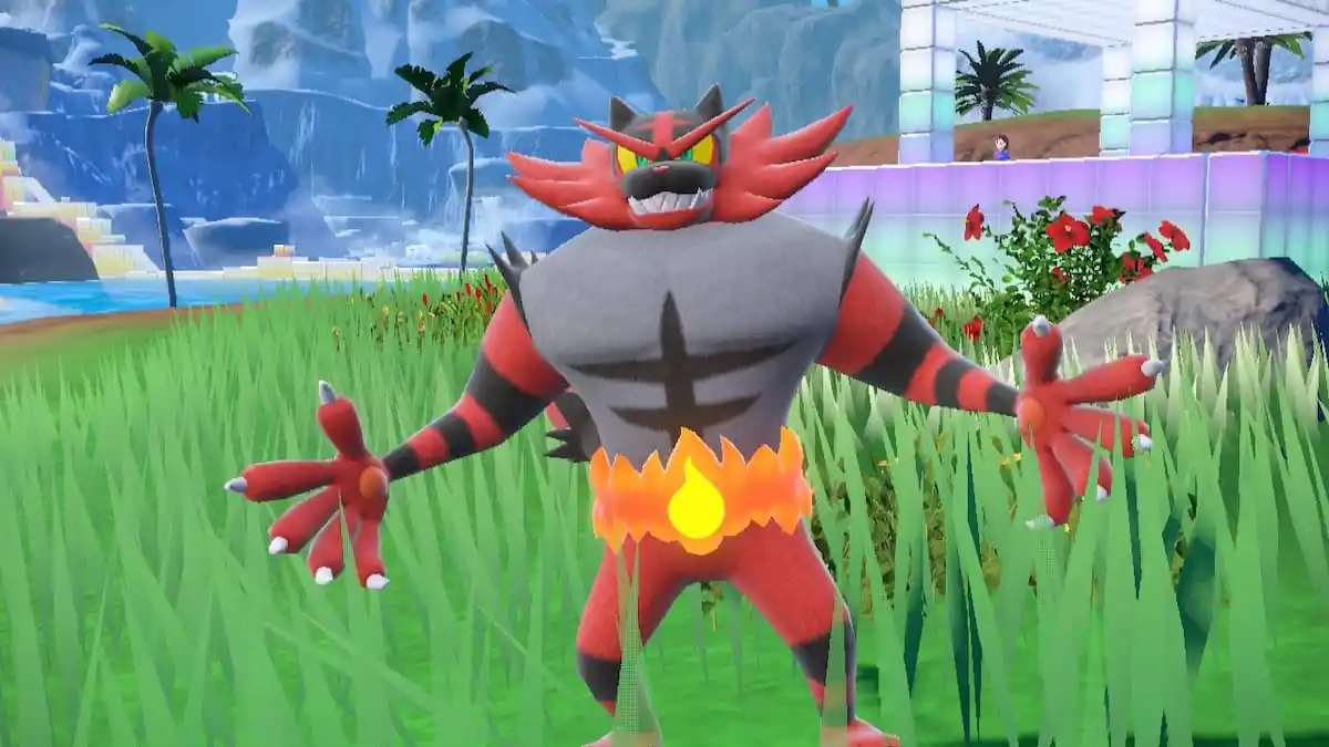 Incineroar posing in a grassy field in Pokémon Scarlet and Violet.