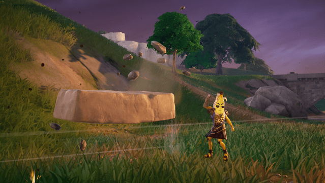 A player in a banana outfit uses the Earthbending ability in Fortnite.